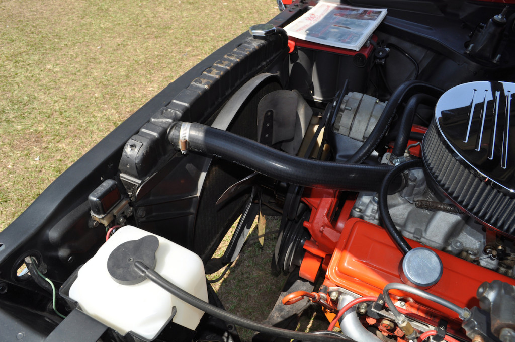 If you run a belt-driven fan, you need to have a proper fan shroud to avoid overheating in traffic. This Chevy II has a shroud that covers the radiator core well, but the fan blades don’t protrude into the shroud. The blades should be half in and half out of the shroud for optimum airflow, and there should be approximately one inch of clearance between the tip of the fan blade and the shroud opening.