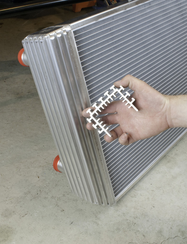 The Flex-a-fit radiator from Flex-a-lite features a patented sidetank design which incorporates cooling fins on the inside and outside. This significantly increases surface contact for better heat transfer. It also makes mounting the radiator brackets, an electric fan and other accessories a breeze, using T-bolts to slide into the channels.