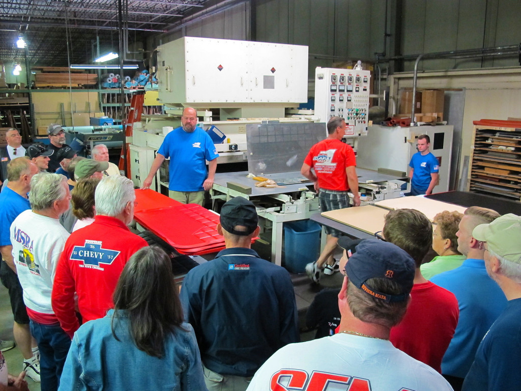 Part of the event was a tour of the CARS Inc. facility, where people could see how interior components are made. Here CARS Inc.’s Dale Deaton explains the process where vinyl is di-electrically pressed into factory correct style patterns.