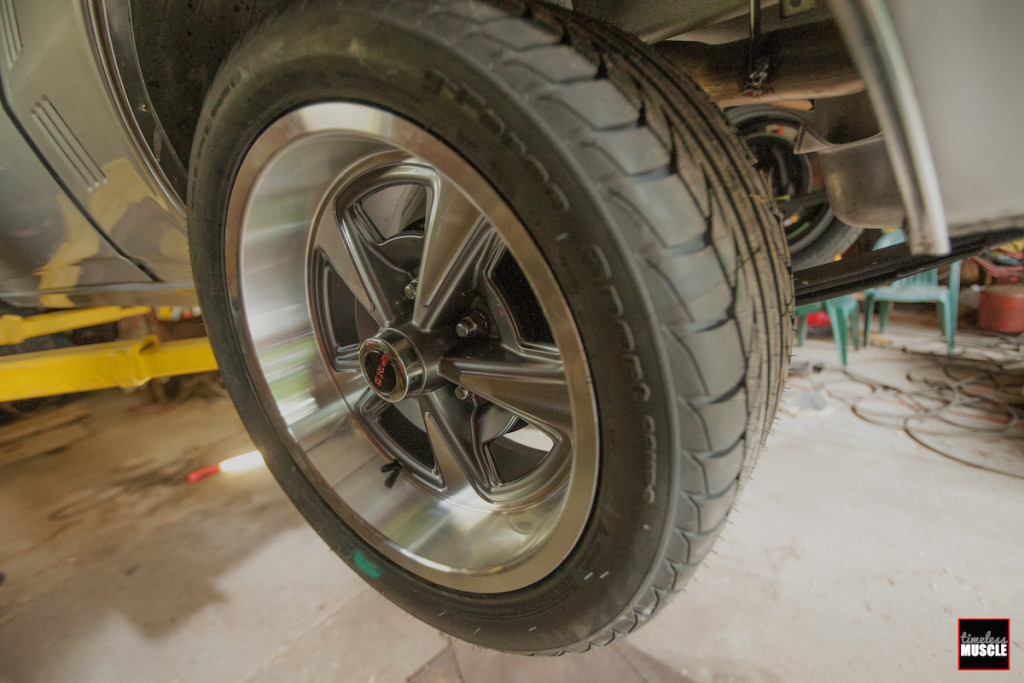 We then lifted the car off the ground, pulled the OEM wheels and installed our new YearOne rollers.